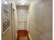 A bright hallway with built-in storage and hardwood floors at 1435 29Th N Ave, St Petersburg, FL 33704