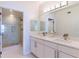 Double vanity bathroom with a large walk-in shower at 16500 Gulf Blvd # 352, North Redington Beach, FL 33708