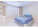 Bedroom with built-in shelving and white bedding at 16500 Gulf Blvd # 352, North Redington Beach, FL 33708
