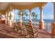 Relaxing ocean view from balcony with rocking chairs at 16500 Gulf Blvd # 352, North Redington Beach, FL 33708