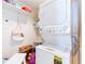Convenient laundry area with stackable washer and dryer at 16500 Gulf Blvd # 352, North Redington Beach, FL 33708