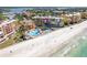 Aerial view showing resort community near the beach with multiple buildings and pool at 16500 Gulf Blvd # 352, North Redington Beach, FL 33708