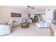 Spacious living room with white furniture and coastal decor at 16500 Gulf Blvd # 352, North Redington Beach, FL 33708