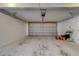 Garage with lawnmower and other storage items at 2136 Duncan Dr, Belleair Bluffs, FL 33770