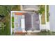 House's backyard and patio from an aerial perspective at 24617 Laurel Ridge Dr, Lutz, FL 33559