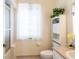 Clean bathroom with a shower/tub combo, toilet, and vanity at 24617 Laurel Ridge Dr, Lutz, FL 33559