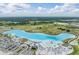 Aerial view of a crystal-clear lagoon and beach at 31867 Magna Gulf Loop, San Antonio, FL 33576