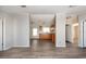 Open concept living area with kitchen and dining area at 38029 Leondias Dr, Zephyrhills, FL 33542