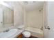 Clean bathroom with a bathtub, toilet, and vanity at 38029 Leondias Dr, Zephyrhills, FL 33542