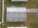 Overhead view of a single-story home's roof and backyard at 38029 Leondias Dr, Zephyrhills, FL 33542