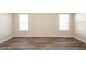 Spacious bedroom with neutral walls and vinyl flooring at 38029 Leondias Dr, Zephyrhills, FL 33542