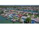 Beautiful aerial view of a waterfront home with a private boat dock and lush landscaping at 4380 44Th S St, St Petersburg, FL 33711