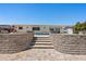 Spacious backyard featuring a pool and paved patio with steps leading to the waterway at 4380 44Th S St, St Petersburg, FL 33711