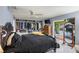 Primary bedroom features a king bed, generous walk in closet and an ensuite bathroom at 4380 44Th S St, St Petersburg, FL 33711