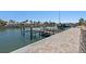 Waterfront boat dock with boat lift, and a calm canal view at 4380 44Th S St, St Petersburg, FL 33711