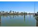 Wide shot of a waterfront canal lined with docks, boats, and lovely homes, showcasing the serene neighborhood at 4380 44Th S St, St Petersburg, FL 33711