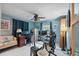 Spacious home office features two desks, comfortable seating, and bright window at 4380 44Th S St, St Petersburg, FL 33711