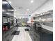 Modern kitchen featuring stainless steel appliances, sleek cabinetry and subway tile backsplash at 4380 44Th S St, St Petersburg, FL 33711