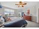 Spacious bedroom with large windows and a walk-in closet at 960 Starkey Rd # 5506, Largo, FL 33771