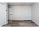 Simple bedroom with wood-look floors and a closet at 10531 Marysville St, Spring Hill, FL 34608