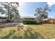 Spacious backyard with a screened patio and fenced yard at 10531 Marysville St, Spring Hill, FL 34608