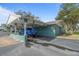 Covered carport with exterior car wash area at 131 114Th Ne Ter # 131, St Petersburg, FL 33716