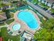 Aerial view of kidney-shaped pool and spa at 131 114Th Ne Ter # 131, St Petersburg, FL 33716