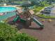 Aerial view of a playground with slides and climbing structures at 131 114Th Ne Ter # 131, St Petersburg, FL 33716