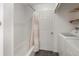 Laundry room with washer, dryer, and ample shelving at 131 114Th Ne Ter # 131, St Petersburg, FL 33716