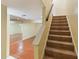 Staircase leading to the upper level of the home at 131 114Th Ne Ter # 131, St Petersburg, FL 33716