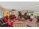 Spacious living room with leather sofas and an open floor plan at 18675 Us Highway 19 N # 488, Clearwater, FL 33764