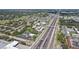 Aerial view of highway and nearby apartment complexes at 18675 Us Highway 19 N # 488, Clearwater, FL 33764