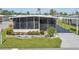 Attractive manufactured home with screened porch and landscaped yard at 18675 Us Highway 19 N # 488, Clearwater, FL 33764