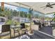 Enclosed porch with seating area, offering a peaceful outdoor space at 18675 Us Highway 19 N # 488, Clearwater, FL 33764
