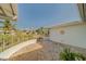 Sidewalk leading to the entrance of a home with a white exterior at 2043 Imperial Way, Clearwater, FL 33764