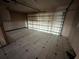 Clean, spacious garage with tiled flooring at 239 Punta Vista Dr, St Pete Beach, FL 33706