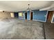 Large living space with adjacent doorways and rich blue accent walls at 239 Punta Vista Dr, St Pete Beach, FL 33706