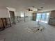 Open room with water views, tiled floor and exposed studs at 239 Punta Vista Dr, St Pete Beach, FL 33706