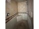 Walk-in shower showcasing tile surround, bench seating, and modern fixtures at 239 Punta Vista Dr, St Pete Beach, FL 33706