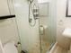 Bathroom with shower and pedestal sink at 3038 Eastland Blvd # F102, Clearwater, FL 33761