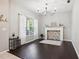 Elegant dining room featuring a chandelier and decorative fireplace at 3407 Fox Squirrel Ln, Valrico, FL 33594