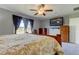 Bright bedroom with water view and large bed at 5220 Butterfly Shell Dr, Apollo Beach, FL 33572