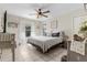 Charming bedroom with a king-size bed and calming decor at 5331 Jacaranda Ave, North Port, FL 34291