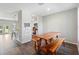 Open concept dining area with kitchen and living room views at 5369 Boxtree Ct, Dade City, FL 33523