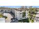 Aerial view of apartment building with parking and landscaping at 5725 80Th N St # 301, St Petersburg, FL 33709