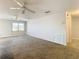 Spacious living room with carpeted floor and ceiling fan at 5725 80Th N St # 301, St Petersburg, FL 33709