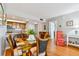 Bright dining room with hardwood floors and casual seating at 6372 Palma Del Mar S Blvd # 605, St Petersburg, FL 33715