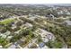 Aerial view showing a neighborhood near a park and body of water at 1016 Beachwood Ave, Clearwater, FL 33759