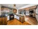 Rustic kitchen with colorful tile backsplash and wooden cabinets at 1126 60Th S St, Gulfport, FL 33707