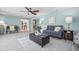 Spacious living room with a comfortable couch and plenty of natural light at 2351 Mangrum Dr, Dunedin, FL 34698